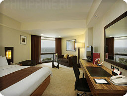 Номер (Deluxe Room) отеля JEN Manila